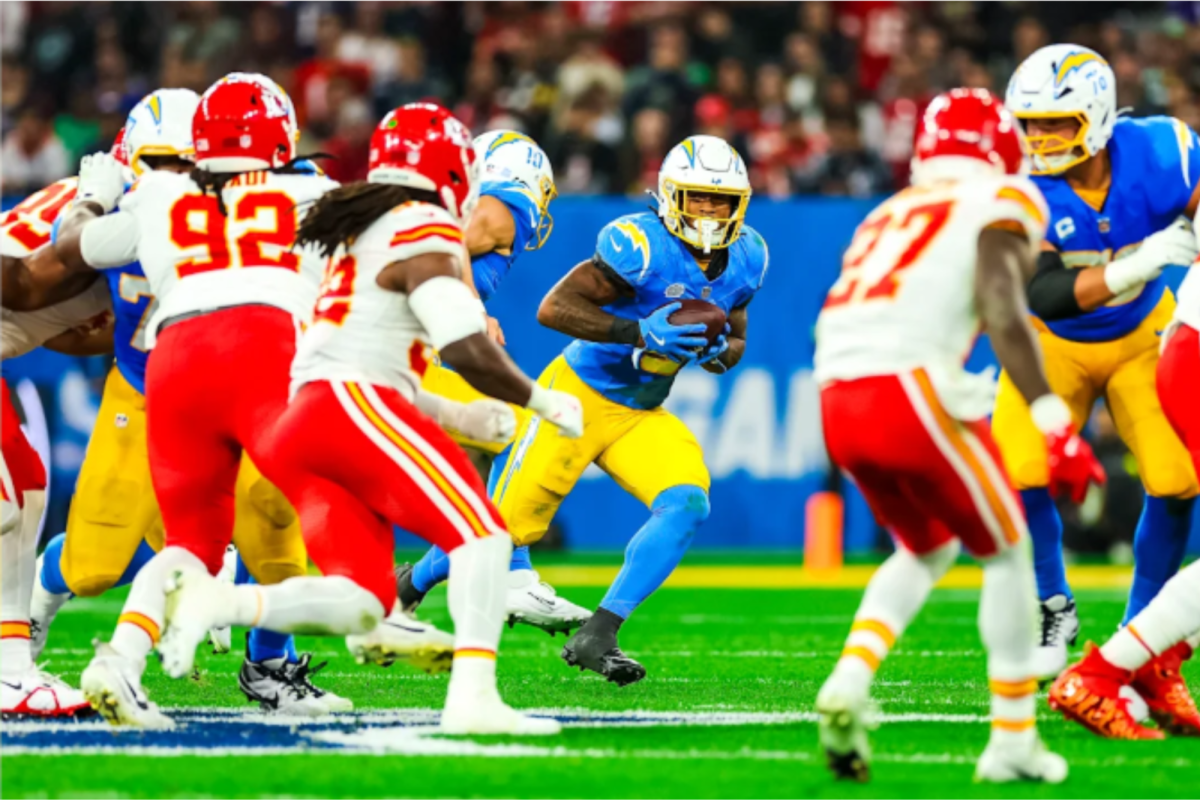The player of the Chargers team, Omario Hampton has the football in his possession during their game Vs. Chiefs in Brazil, on Sep 5. One of the NfL international games to bring more followers and fans around the world.

