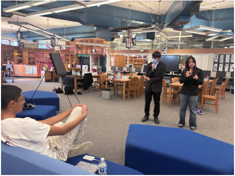 Taken by Allison Hernandez on February 2, in the media center at Los Altos getting coached on their DUO event for Harvard. Coach Nathan diligently coaches Audrey (12th) and Kendrick (9th) and makes edits to the performance he deems will make it stronger on a competitive level. 
