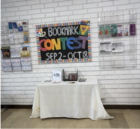 The Bookmark contest activity that is being offered at the Hacienda Heights Library and all LA County Libraries, from Sep 2 - Oct 18. The books that are for sale for $0.25 and some brochures and papers with all the programs and activities that are coming up.

