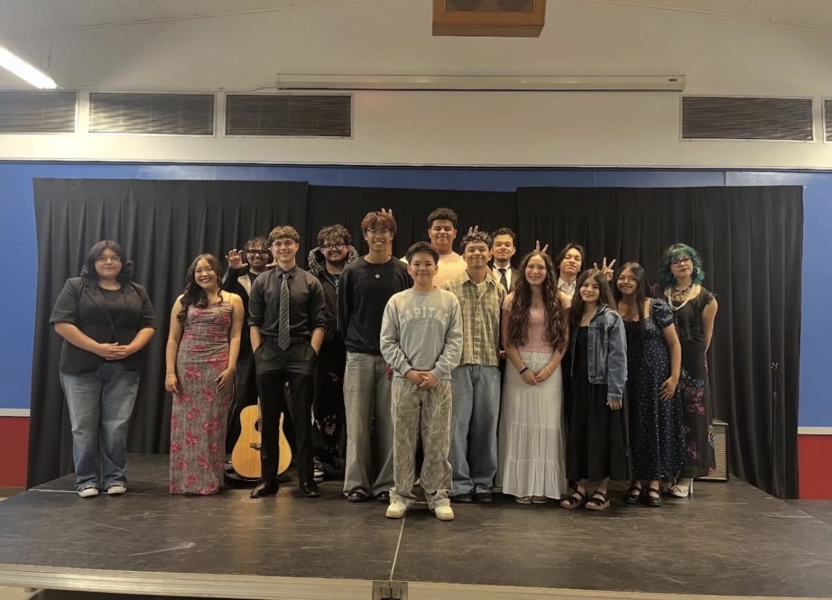In the Hacienda of LAHS, all of the Solo Night Concert performers stand on a stage proudly together before their concert opens its doors to the public.